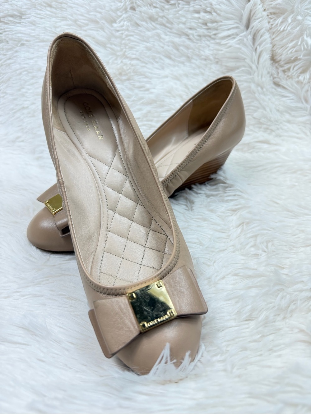 Cole Haan Beige Bow Wedge Pumps with Gold Accent